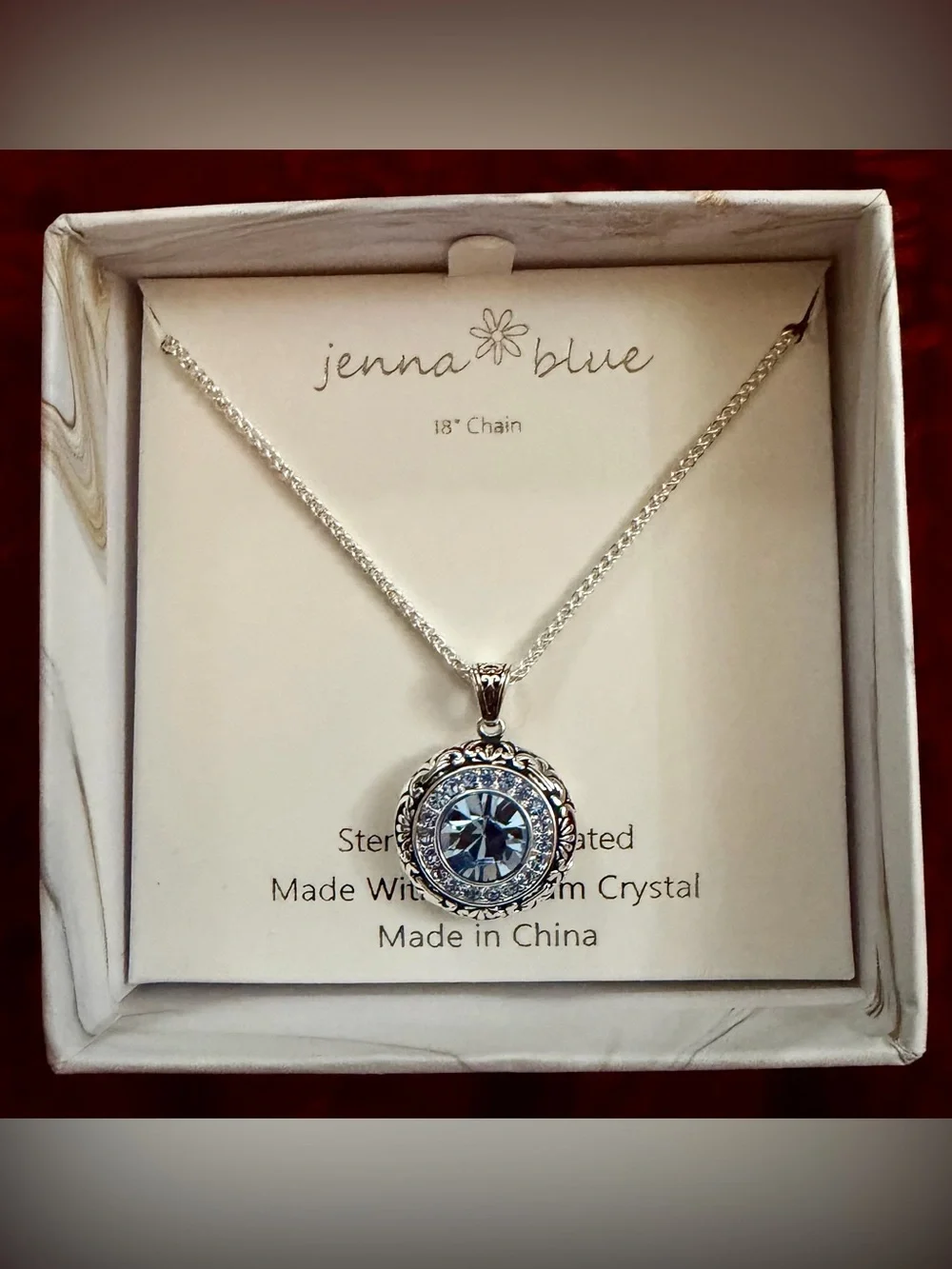 Sterling Silver Plated Necklace with Light Blue Crystal Pendant